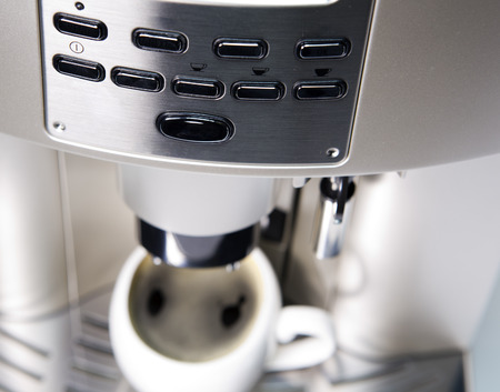 Modern Coffee Machine and a cupの写真素材