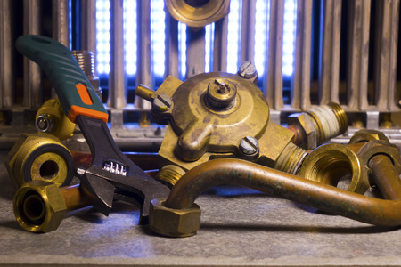 the part of gas boiler, water fittings and adjustable spanner