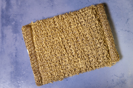 bast from natural fiber on a tile, flat layの写真素材