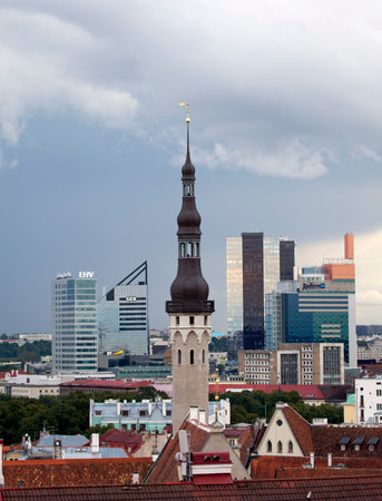 TALLINN, ESTONIA- SEPTEMBER 9, 2015: Old houses on the Old city streets and the new modern  area on a background. Tallinn, Estoniaのeditorial素材