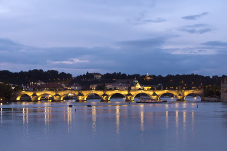 Prague at night with Charles Bridge(Karluv Most)  over Vltava riverの写真素材