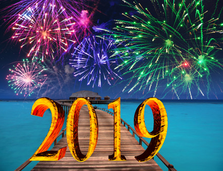 New Year inscription 2019 on the wooden road over the seaの写真素材