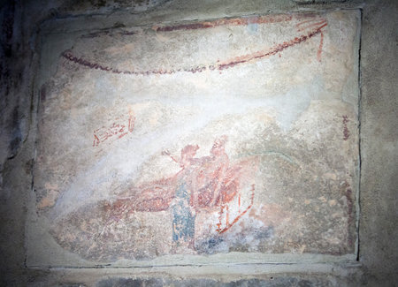 ITALY, POMPEII- SEPTEMBER 21, 2010: murals, paintings on the walls in the ruins of Pompeiiのeditorial素材