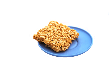 instant noodles on White background in dishの写真素材