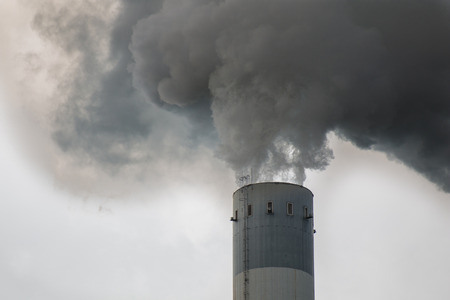 Industrial smoke pollution from a chimney in Germanyの写真素材