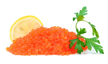 caviar red in a glass jar with lemon and parsley isolated on white backgroundの写真素材