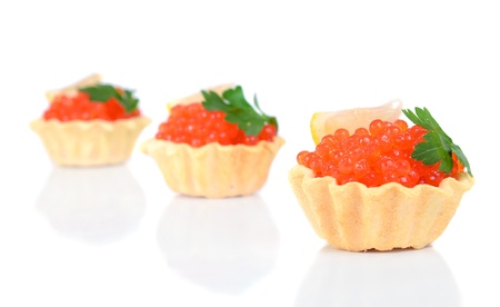 caviar red is in a panary small basket isolated on white backgroundの写真素材