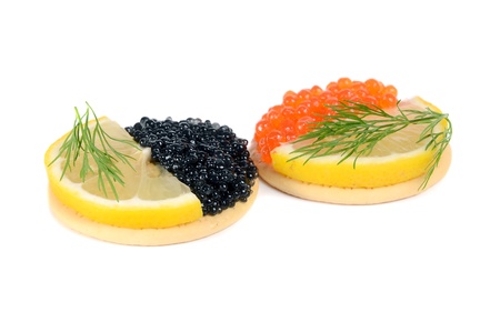sandwich with black and red caviar isolated on white backgroundの写真素材
