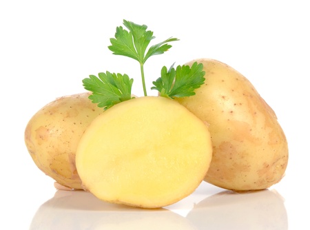 fresh raw potatoes isolated on white backgroundの写真素材