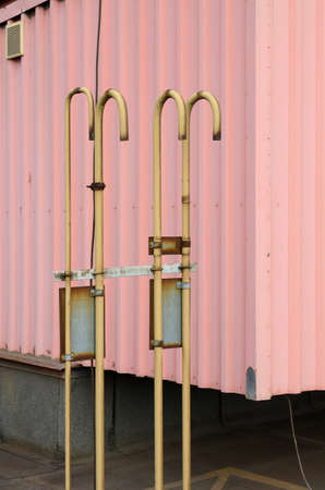 Detail of venting a gas pipe on the roof of a factory.