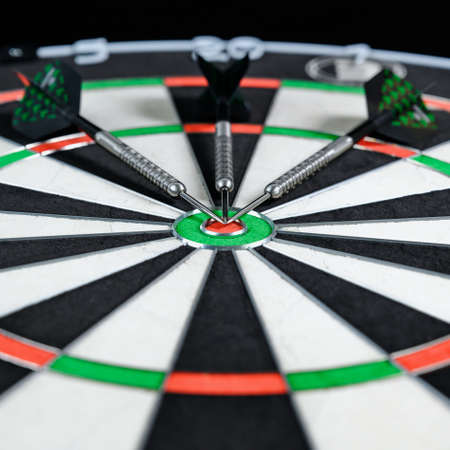 Three darts placed on a target.の写真素材