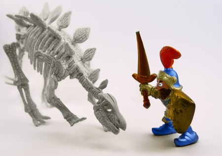 on a white background is a toy and the skeleton of an animalの写真素材