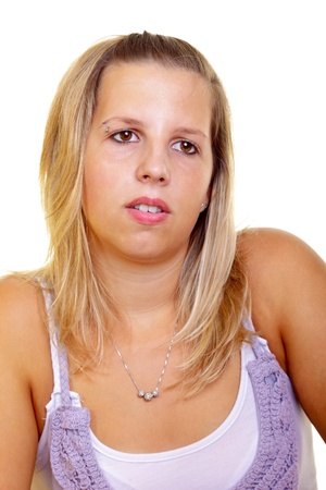 Portrait of a young blond woman on white backgroundの写真素材