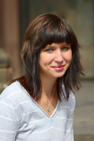 Outdoor portrait of a young girl  in a small city Dillingen, Saarland / Germanyの写真素材