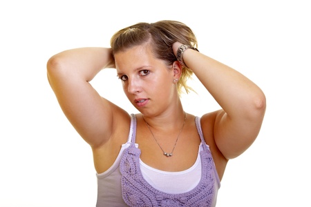 Portrait of a young blond woman on white background, studio shot. の写真素材