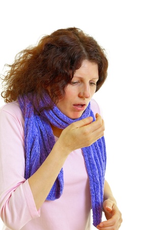 Young woman with brown hair has a flu, isolated on white background, studio shot. の写真素材
