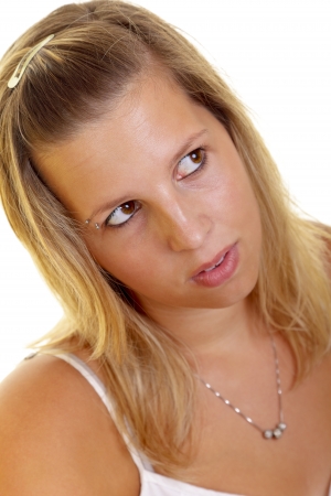 Portrait of a young blond woman on white backgroundの写真素材