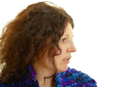 Young brown-haired woman with wool scarf の写真素材