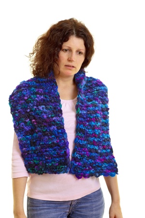 Young brown-haired woman with wool scarf の写真素材