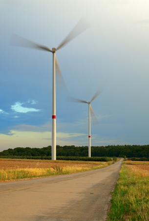 Agriculture landscape with windturbines, by Beckingen, Saarland - Germany, warm evening sun, stitched - original sizeの写真素材
