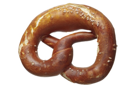 Close up  of a pretzel with salt, isolated on whiteの写真素材