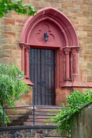 A church door in small city Saarburg, Rheinland-Pfalz, Germanyの写真素材
