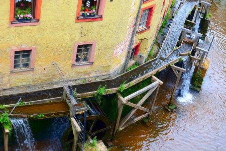 Mill wheels on stream Leuk ( too Leukbach ) in Saarburg, Rheinland-Pfalz, Germany, summerの写真素材