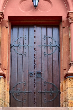 A church door in small city Saarburg, Rheinland-Pfalz, Germanyの写真素材