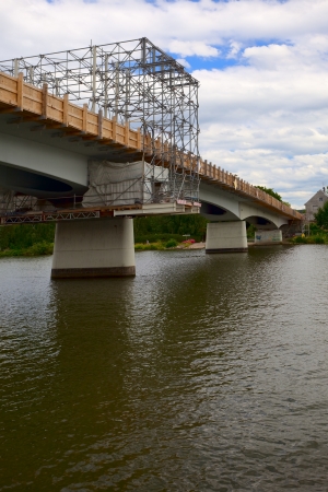 View of the bridge (border bridge) by renovation, city Remich / Luxembourg, evening, summer 2009, river Moselle, in the distance Germanyのeditorial素材