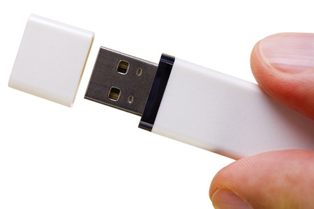 Close up of a USB flash memory isolated on whiteの写真素材
