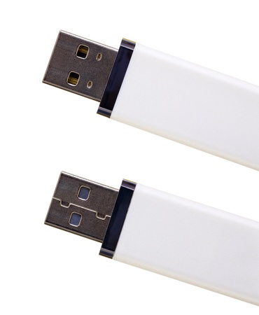 Close up of a USB flash memory isolated on whiteの写真素材