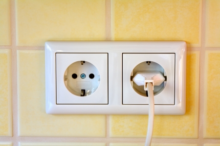 Close up of a new modern  wall socket (Germany),の写真素材