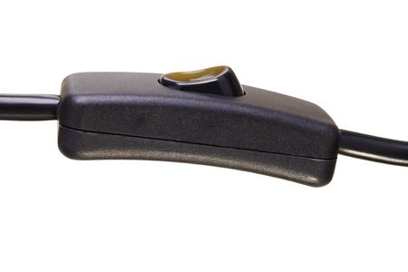 Close up of modern light switch isolated on whiteの写真素材