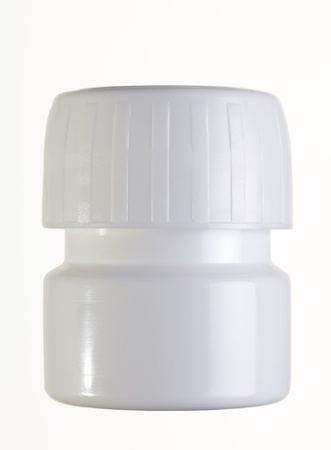 Clode up of a plastic pill container isolated on white backgroundの写真素材