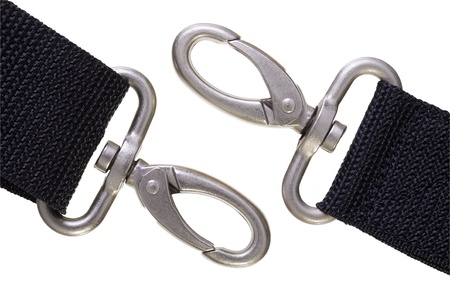 Close up of a textile belt with snap-hook isolated on whiteの写真素材