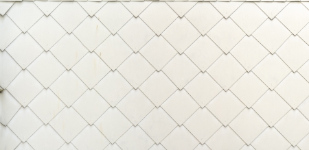 View on a wall with asbestos-cement tiles as interesanting archtecture background. Stitchedの写真素材