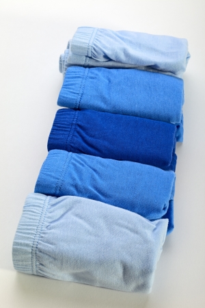 Close up of blue cotton underpants isolated on white backgroundの写真素材