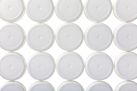 Close up of a plastic lids ( from milk container ) a s backgroundの写真素材