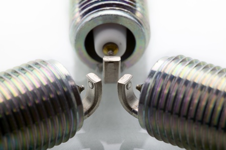 Close up of a spark plug isolated on white backgroundの写真素材