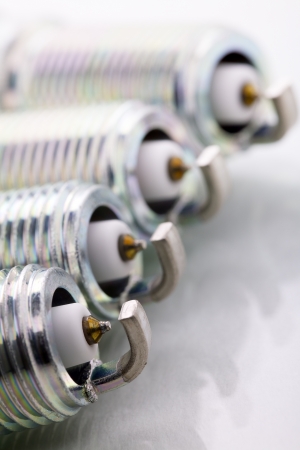 Close up of a spark plug isolated on white backgroundの写真素材