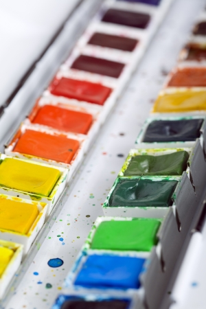 Close up of artistic aquarell paints in a metal boxの写真素材
