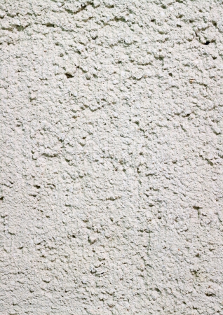 Close up of a  cement plastered wall as a architectur backgroundの写真素材