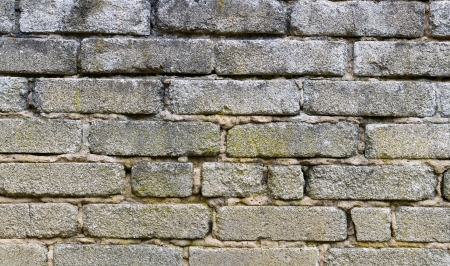 A sand brickstone wall as a architecture backgroundの写真素材
