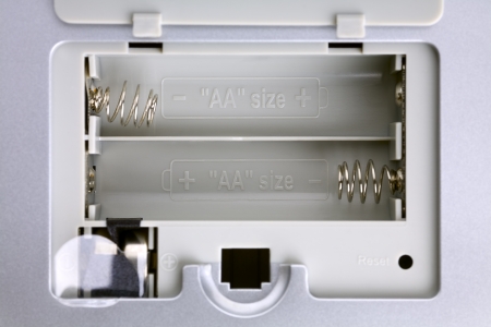 Close up of a open battery slotの写真素材