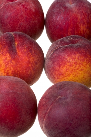 Close up of a peach fruits isolated of white backgroundの写真素材