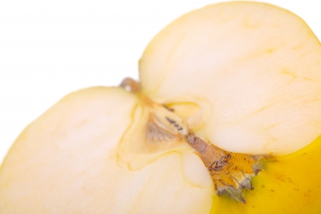 Close up of a half of apple fruit, isolated on white backgroundの写真素材