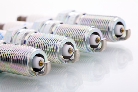 Close up of a spark plug isolated on white backgroundの写真素材
