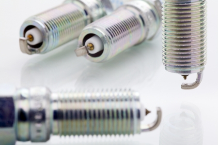 Close up of a spark plug isolated on white backgroundの写真素材