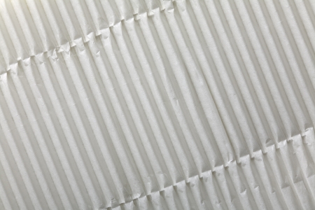 Close up of a white wrapping cardboard/paper as  a backgroundの写真素材