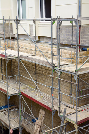 View of a metal scaffolding by renovation work on a historic building, city Luxembourg / Luxembourgの写真素材